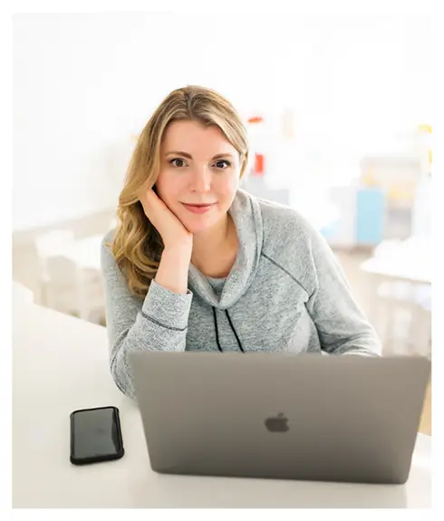 female and a laptop